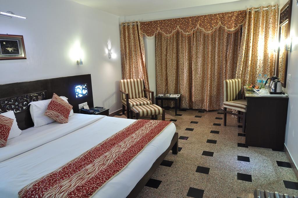Hotel Venkatesh International Rāipur Rum bild